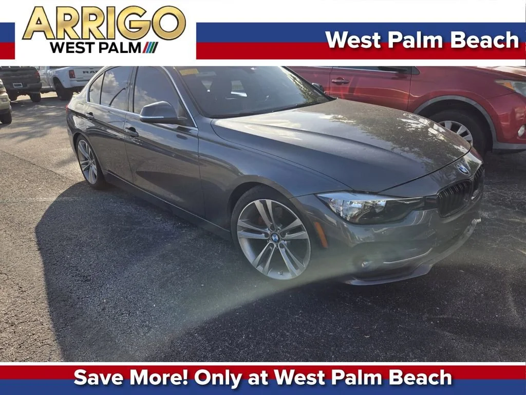 Used 2017 Mineral Gray Metallic BMW 330i image 1