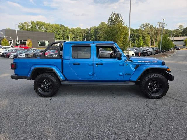 Used 2024 Blue Jeep Sport image 10