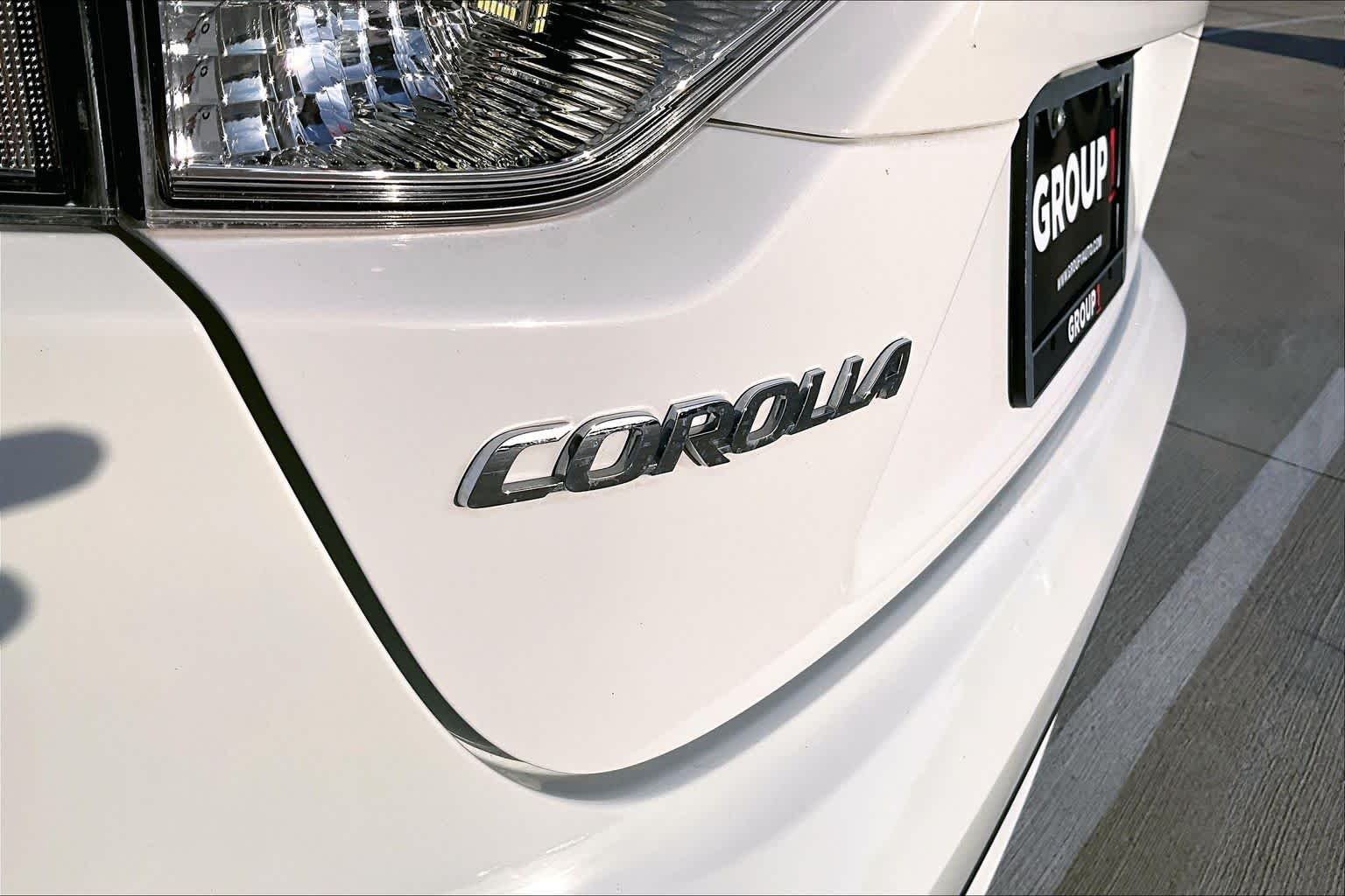 Used 2021 Super White Toyota LE image 10