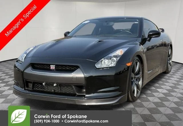 Used 2009 Black Obsidian Nissan Premium image 1