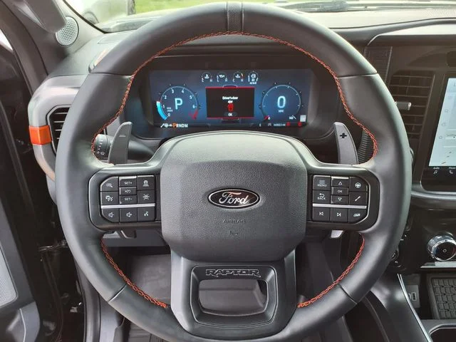 Used 2025 Blue Metallic Ford Raptor image 16