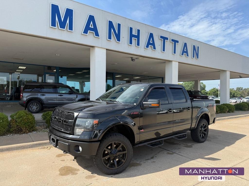 Used 2013 Tuxedo Black Metallic Ford FX4 image 1