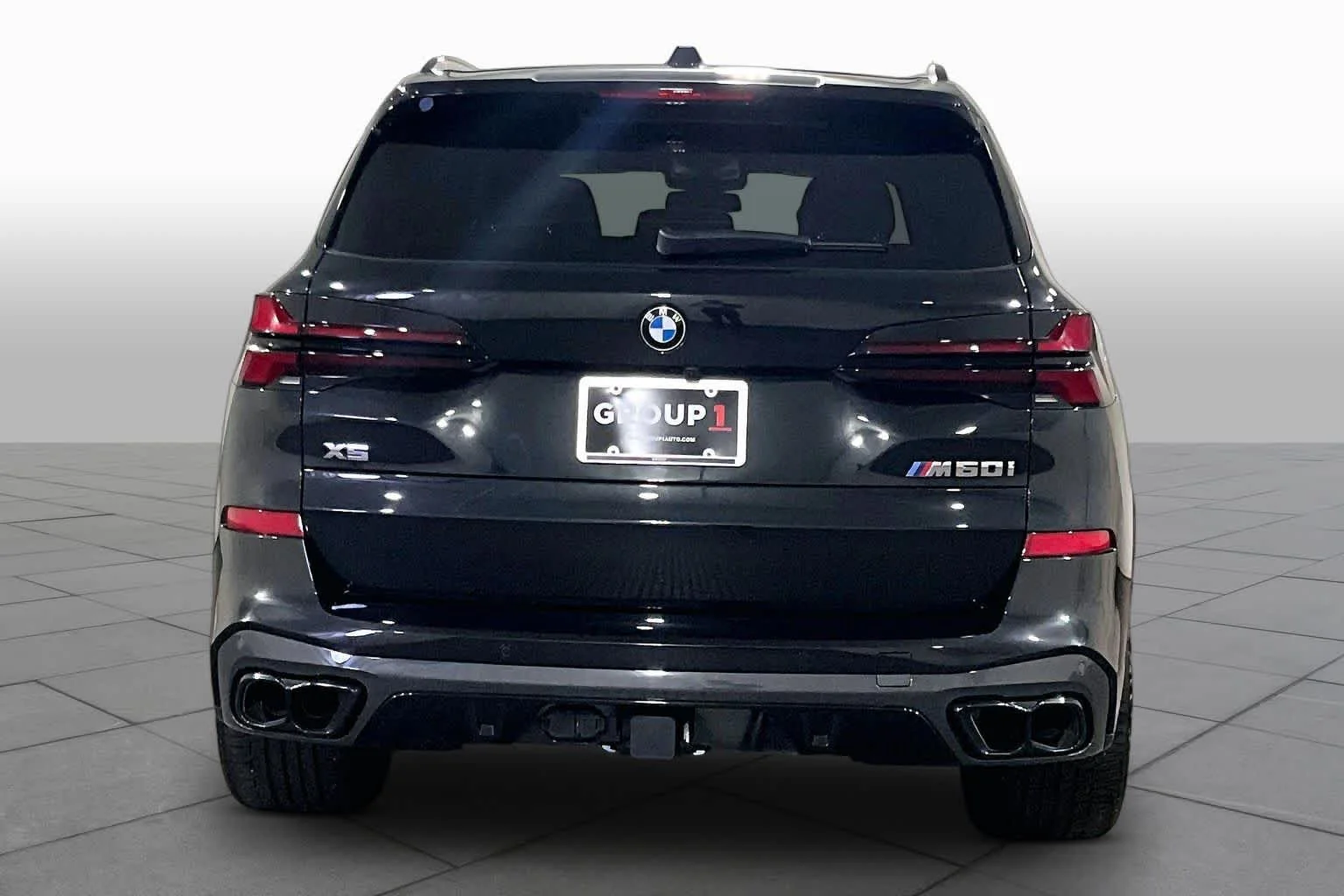 Certified Used 2024 Black Sapphire Metallic BMW M60i image 4