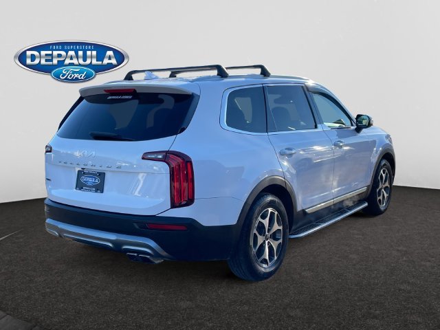 Used 2022 White Pearl Kia EX image 7