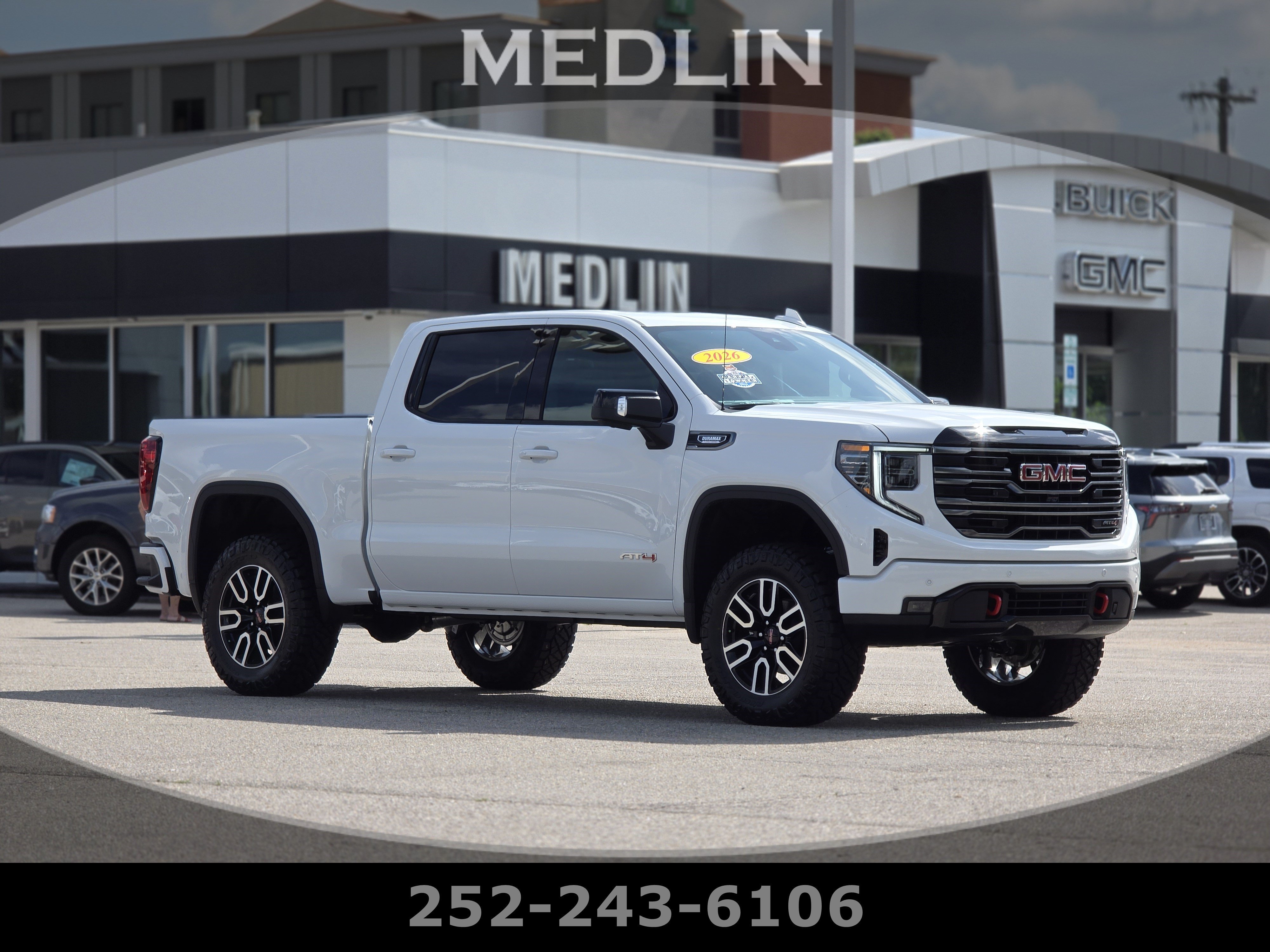 Used 2026 Summit White GMC AT4 image 1