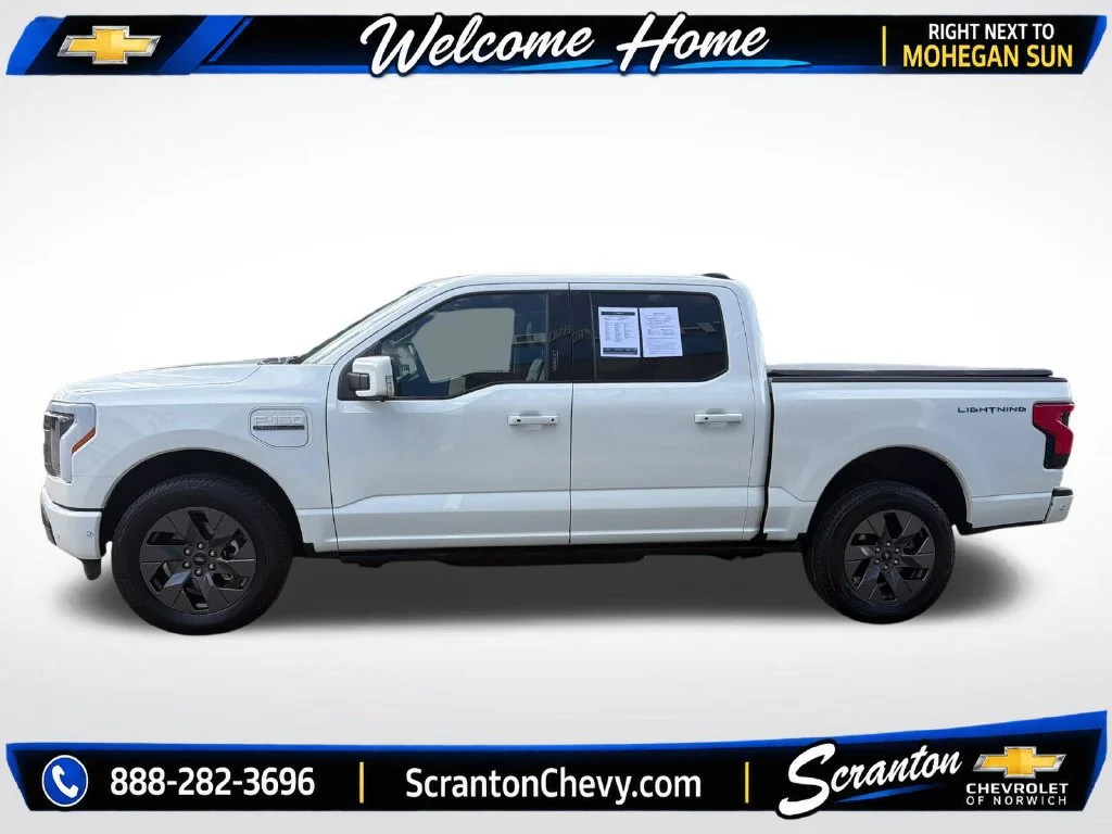 Used 2023 Ford F-150 Lightning Lariat with VIN 1FTVW1EV7PWG10628 for sale in Norwich, CT