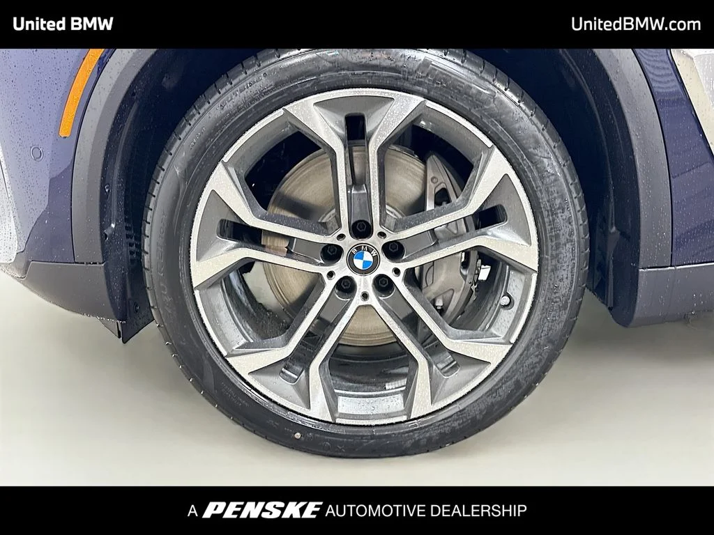New 2026 Tanzanite Blue II Metallic BMW xDrive50e image 2