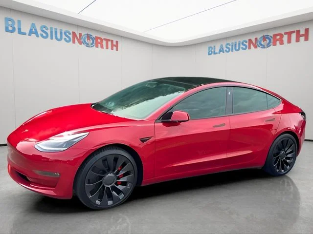 Used 2022 Red Tesla Performance image 1