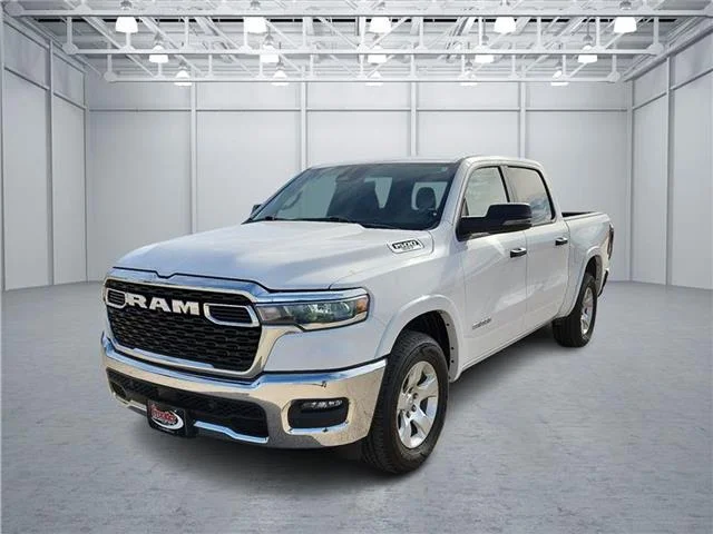 Used 2025 Bright White Clearcoat RAM Big Horn/Lone Star 4x4 Crew Cab 144.5 in. WB image 1