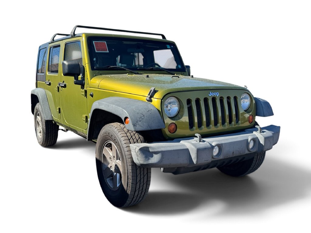 Used 2010 Green Jeep Unlimited Sport image 15