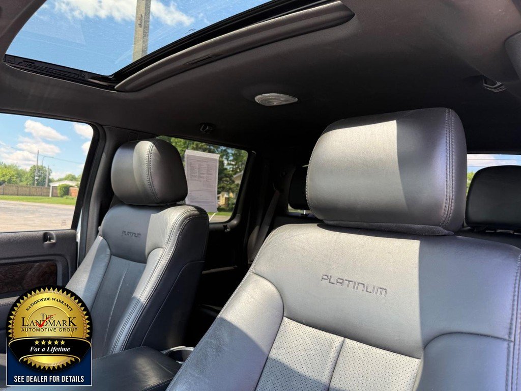 Used 2013 White Platinum Metallic Tri-Coat Ford 4WD SuperCrew 145" Platinum image 9