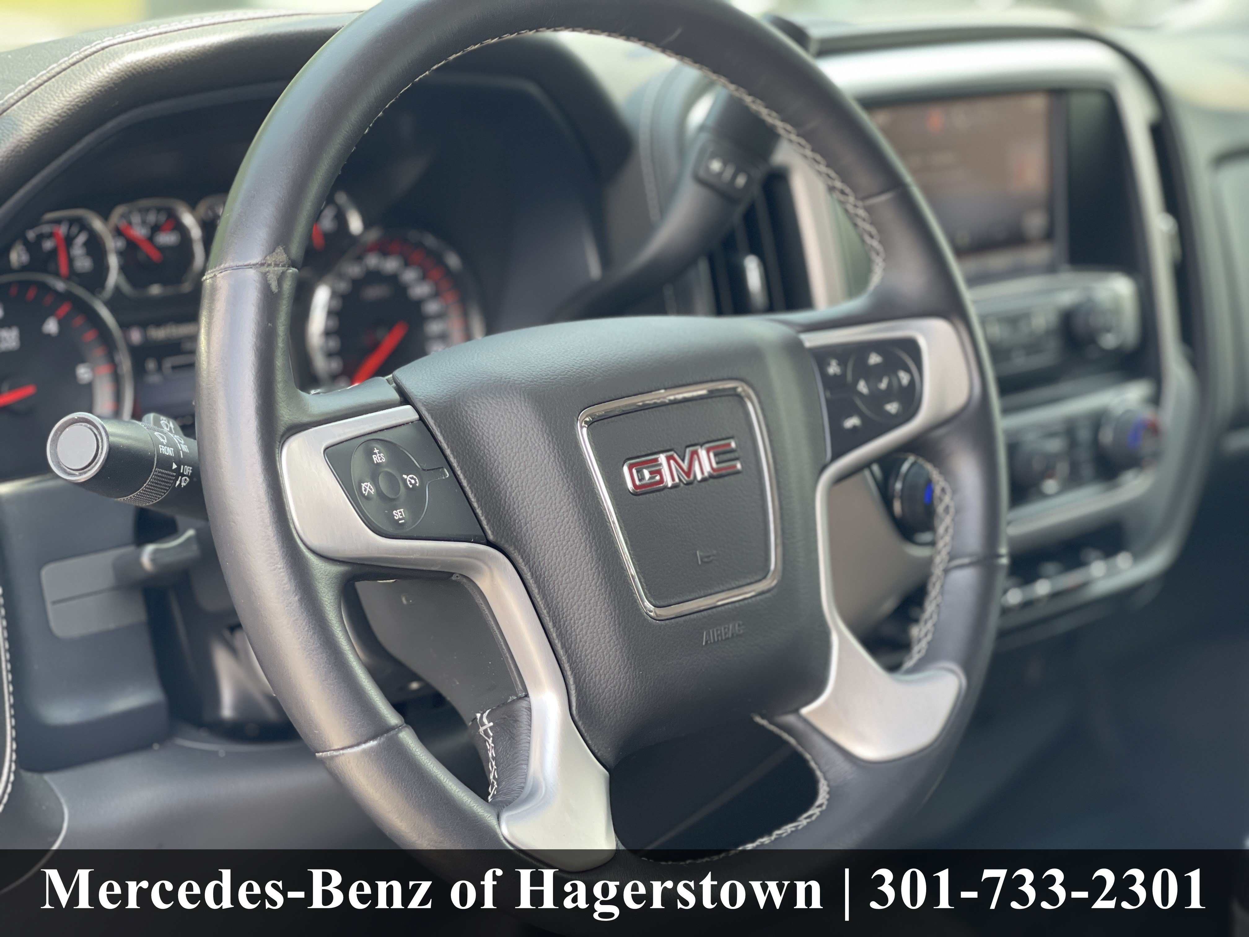 Used 2015 Quicksilver Metallic GMC SLE 4WD Crew Cab 153.0 image 10
