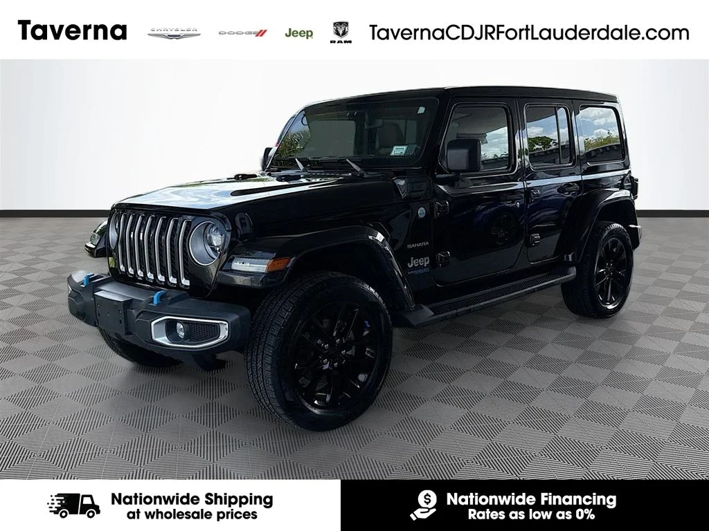 Used 2022 Black Jeep Unlimited Sahara 4xe image 1
