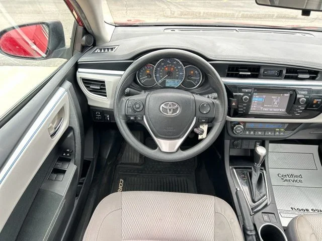 Used 2016 Barcelona Red Metallic Toyota LE image 24