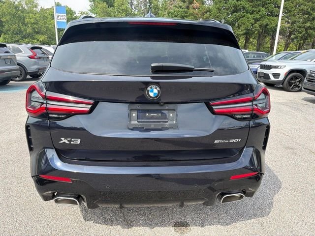 Used 2024 Black BMW sDrive30i image 4