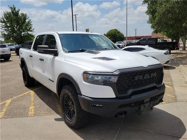 Used 2025 Bright White Clearcoat RAM Rebel 4x4 Crew Cab 144.5 in. WB image 6