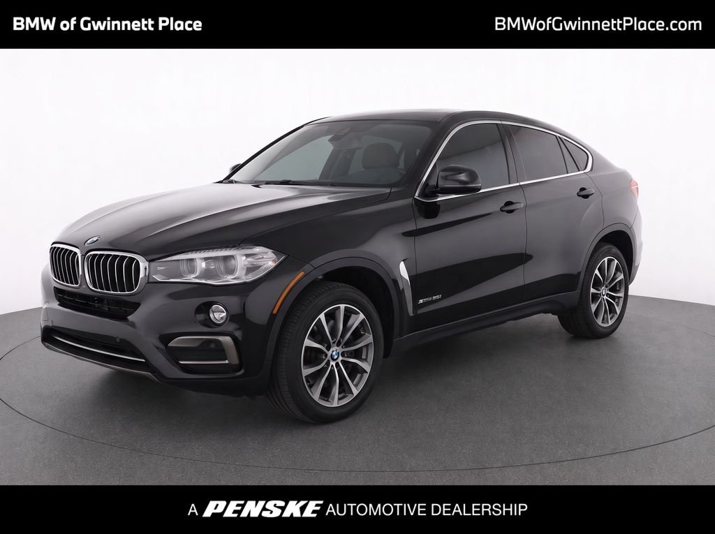Used 2019 Black Sapphire Metallic BMW sDrive35i image 1