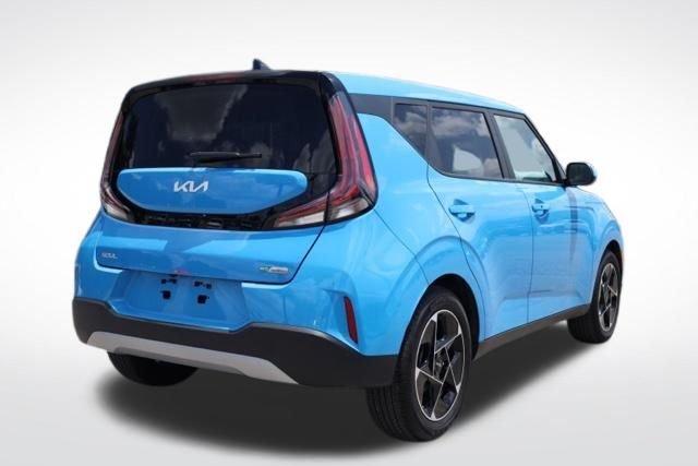 Used 2025 Surf Blue Kia EX image 12