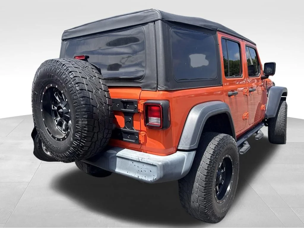 Used 2019 Orange Jeep Unlimited Sport image 15