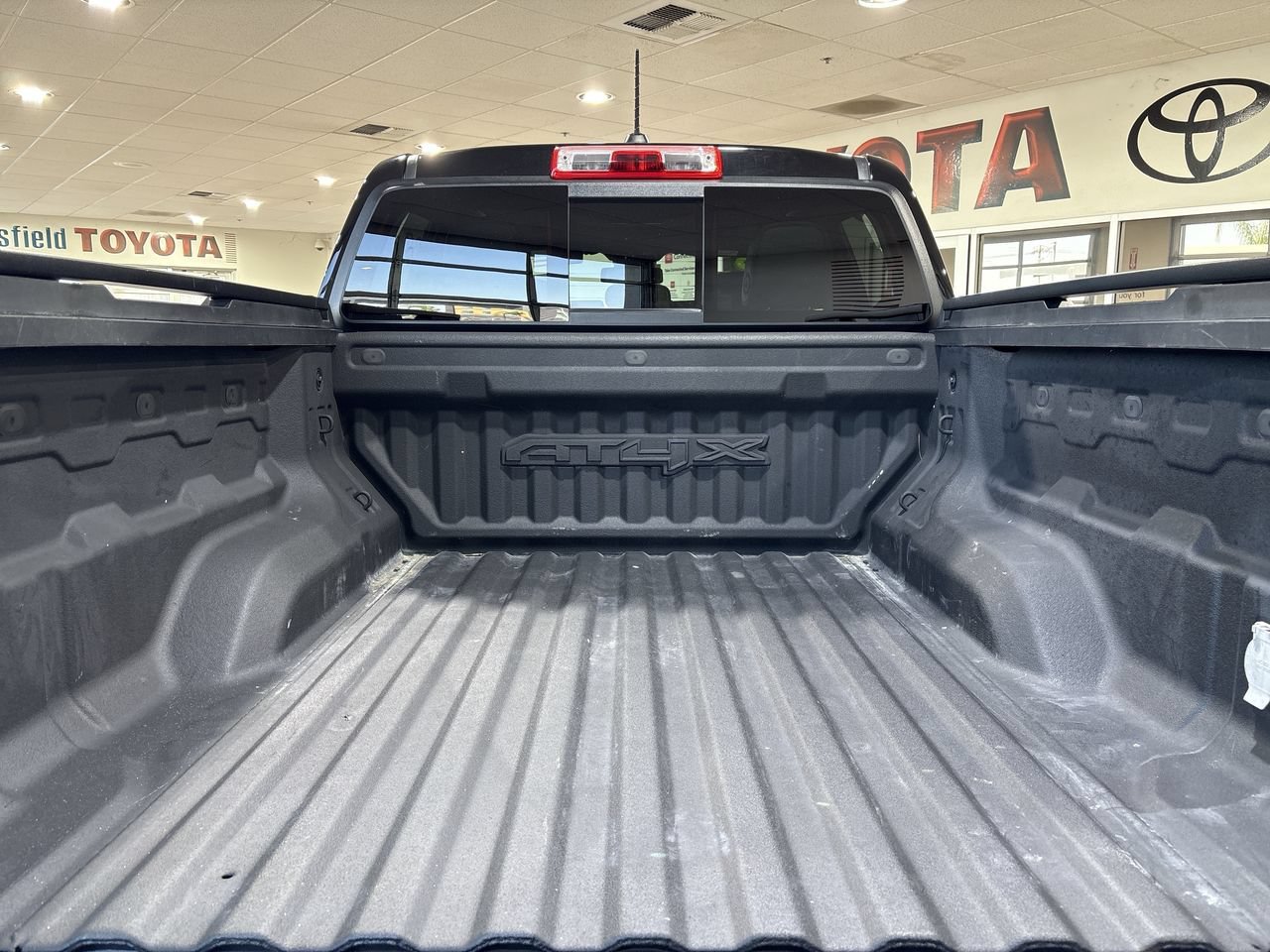 Used 2023 Onyx Black GMC 4WD AT4X image 25