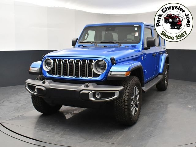 Used 2024 Jeep Wrangler 4-Door Sahara with VIN 1C4PJXEG1RW344778 for sale in Burnsville, Minnesota