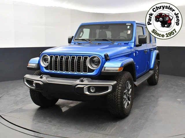Used 2024 Jeep Wrangler 4-Door Sahara with VIN 1C4PJXEG1RW344778 for sale in Burnsville, Minnesota