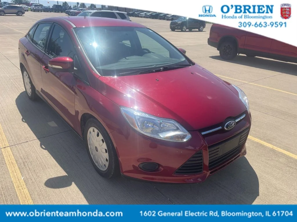 Used 2013 Ruby Red Metallic Ford SE image 1
