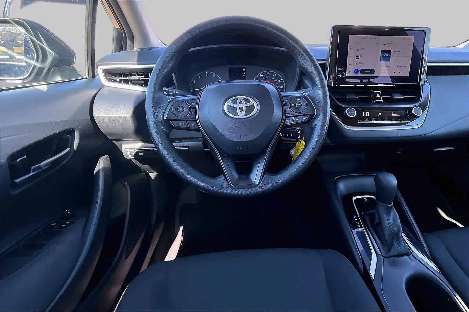 Used 2025 Midnight Black Metallic Toyota LE image 6