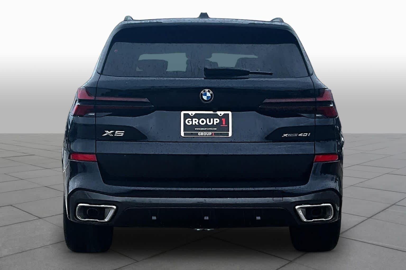 Used 2026 Carbon Black Metallic BMW xDrive40i image 4