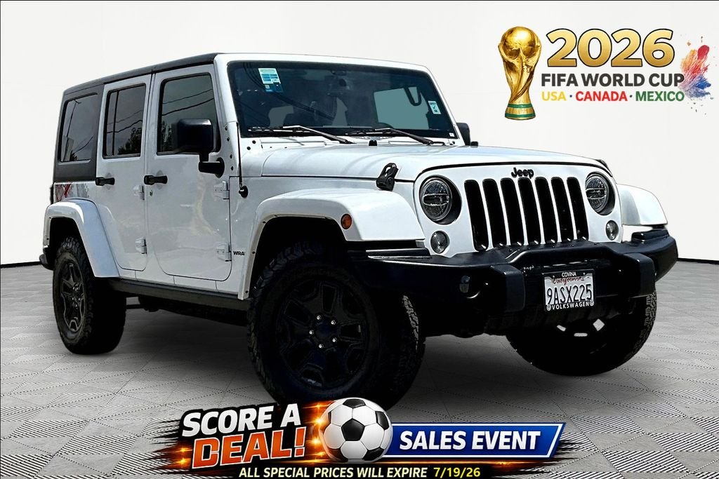 Used 2016 White Jeep Unlimited Sahara image 1