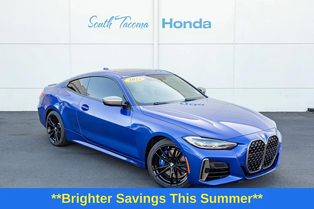 Used 2022 Blue Metallic BMW M440i xDrive image 1