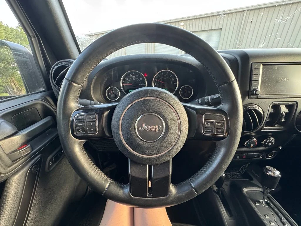 Used 2017 Black Jeep Unlimited Sahara image 14