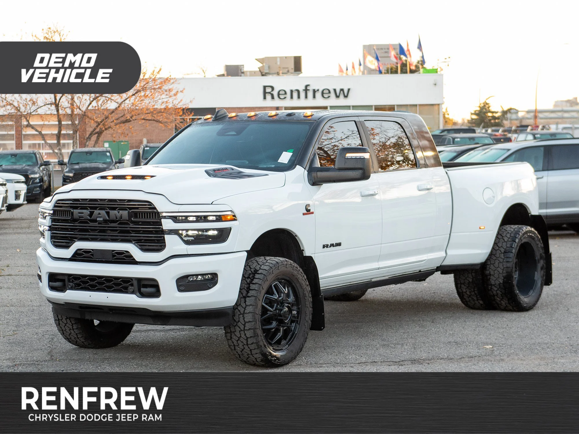 Used 2026 White RAM Laramie* Mega Cab 4x4, 2 Inch Lift, 35 Inch Tires image 1