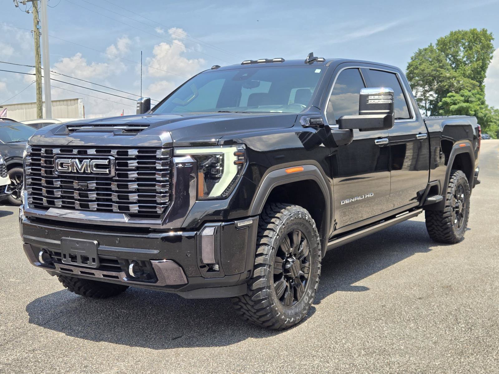 Used 2024 ONYX BLACK GMC Denali Ultimate image 1