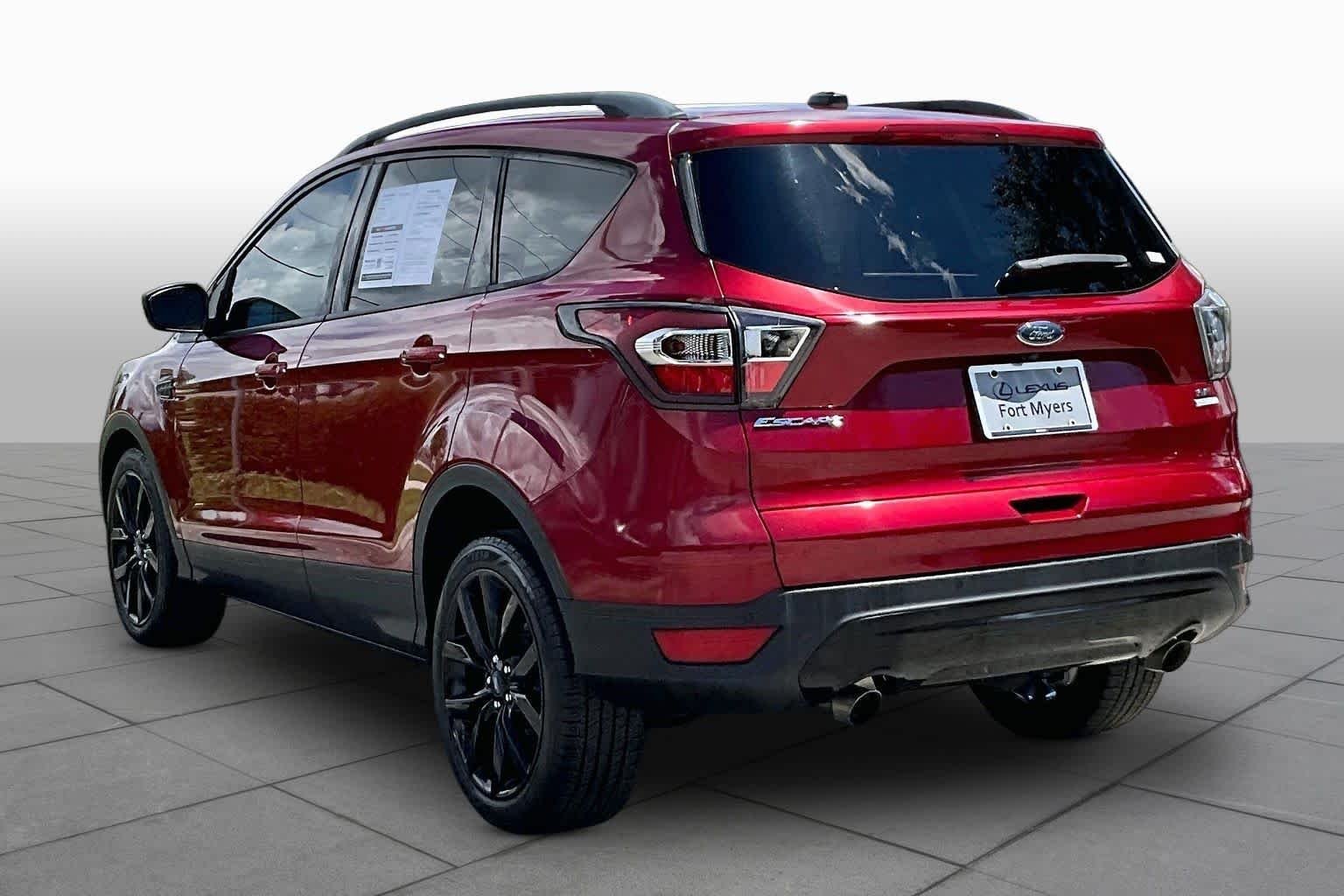 Used 2017 Ruby Red Metallic Tinted Clearcoat Ford SE image 12