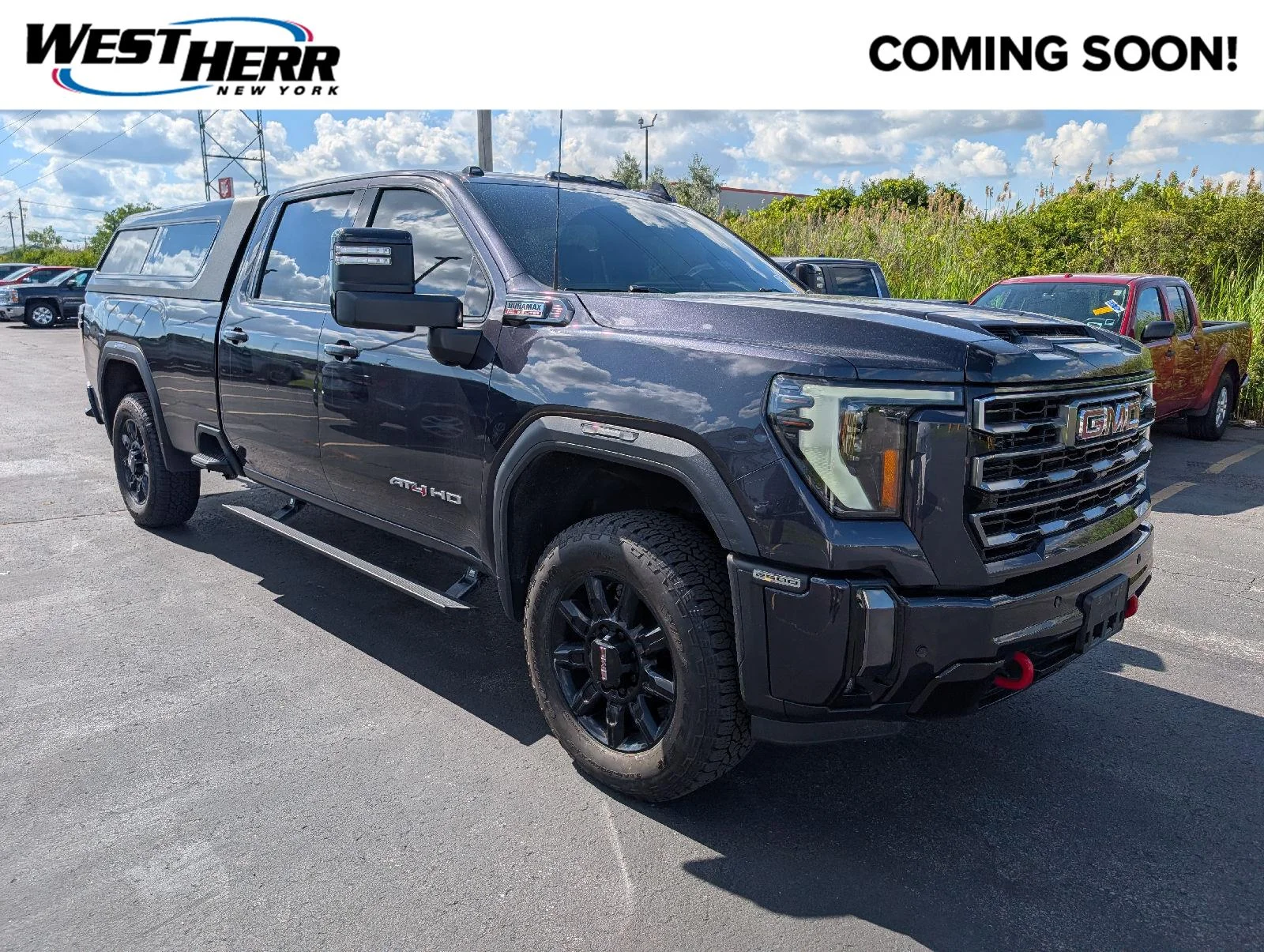 Used 2024 Titanium Rush Metallic GMC AT4 image 1