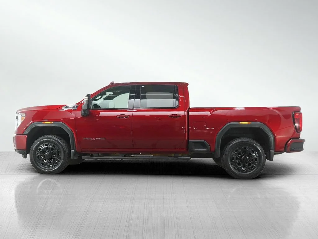 Used 2021 GMC Sierra 2500HD AT4 with VIN 1GT19PE73MF261702 for sale in Roseville, Minnesota
