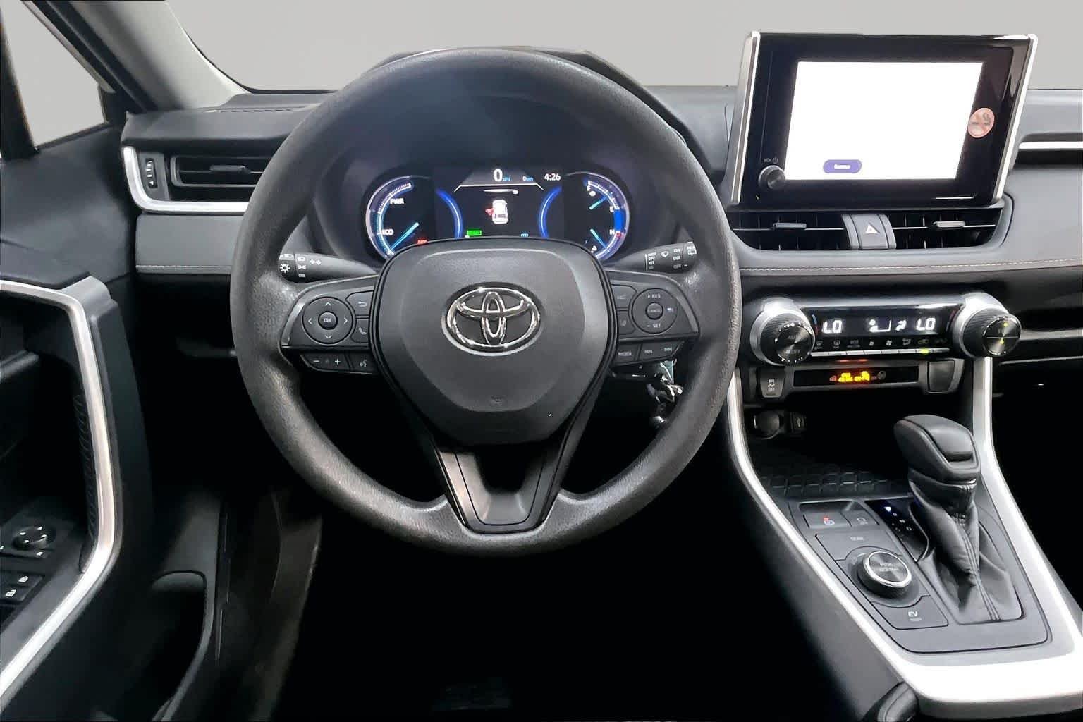 Used 2025 Midnight Black Metallic Toyota Hybrid LE image 6