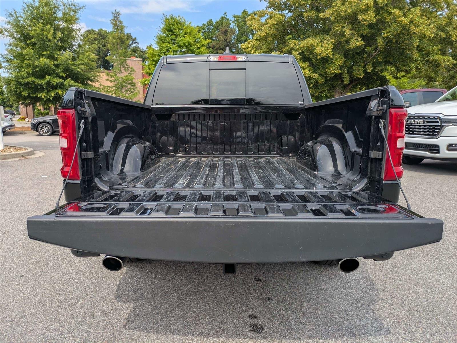 Used 2025 Diamond Black Crystal Pearlcoat Ram Laramie image 15