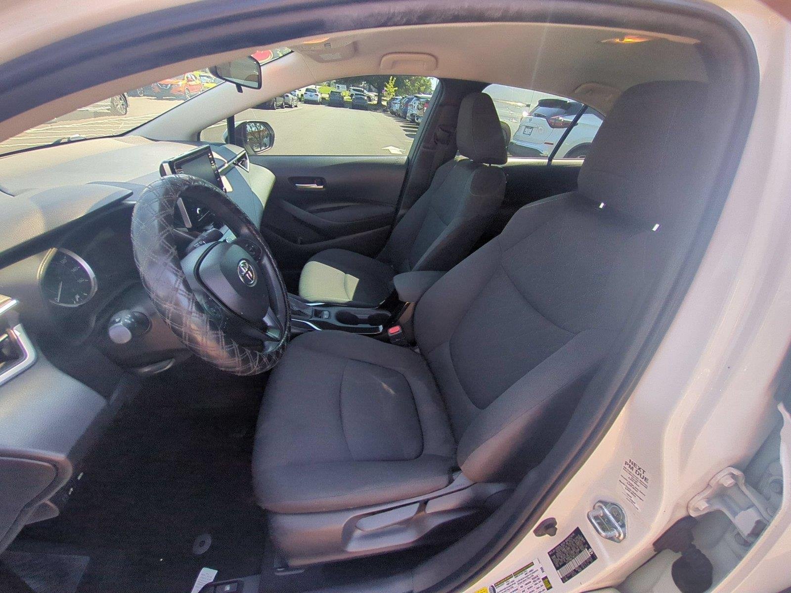 Used 2021 Super White Toyota LE image 18