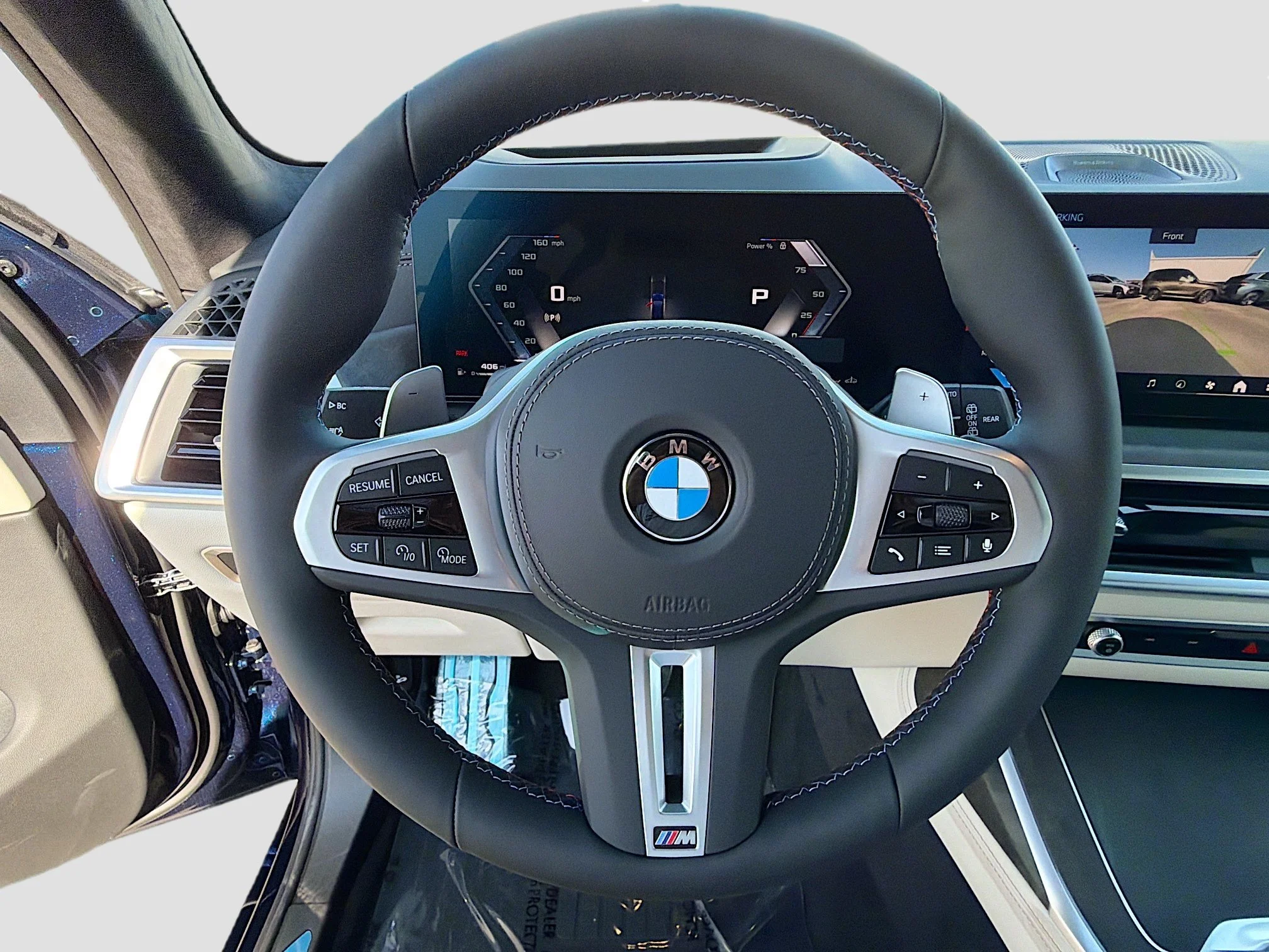 New 2027 Tanzanite Blue II Metallic BMW M60i image 38