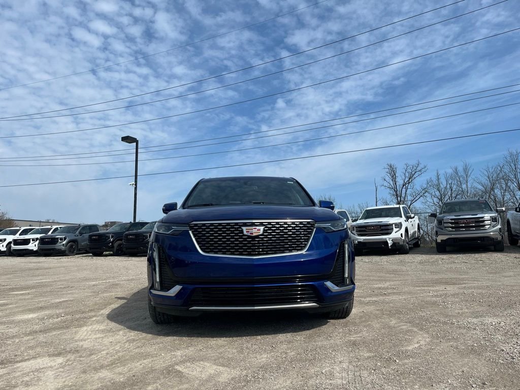 Used 2025 Blue Metallic Cadillac Luxury image 4