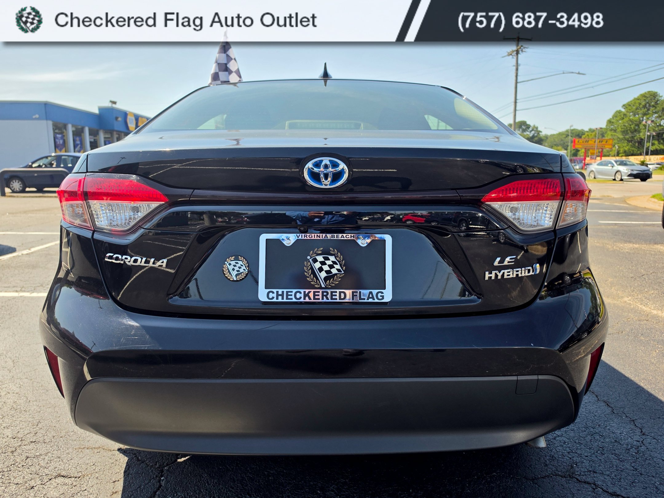 Used 2023 Midnight Black Metallic Toyota LE image 4