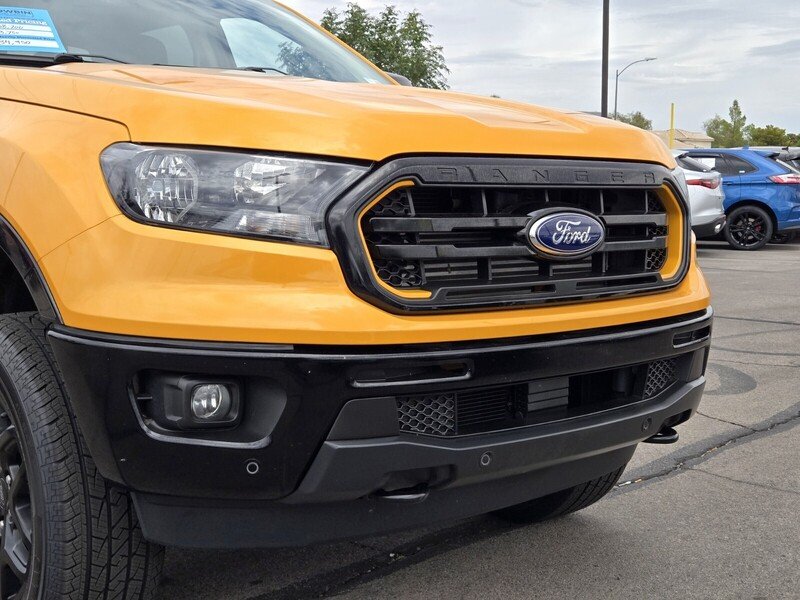 Used 2022 Orange Metallic FORD XLT 4WD SUPERCREW 5