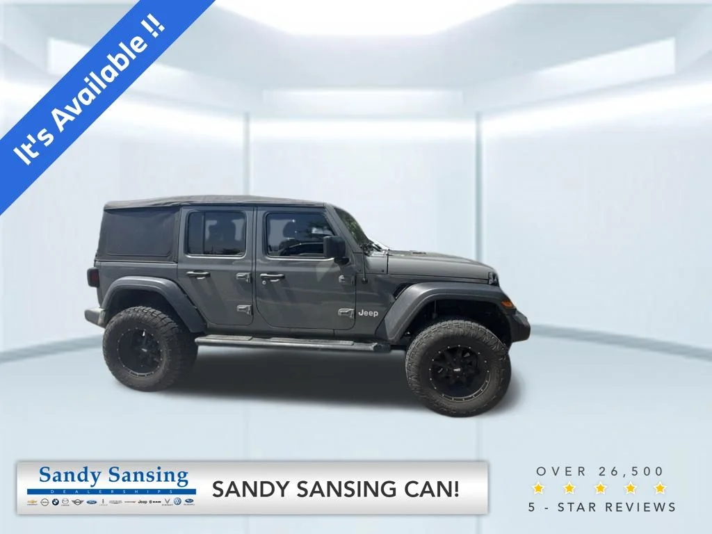 Used 2018 Gray Jeep Unlimited Sport image 1