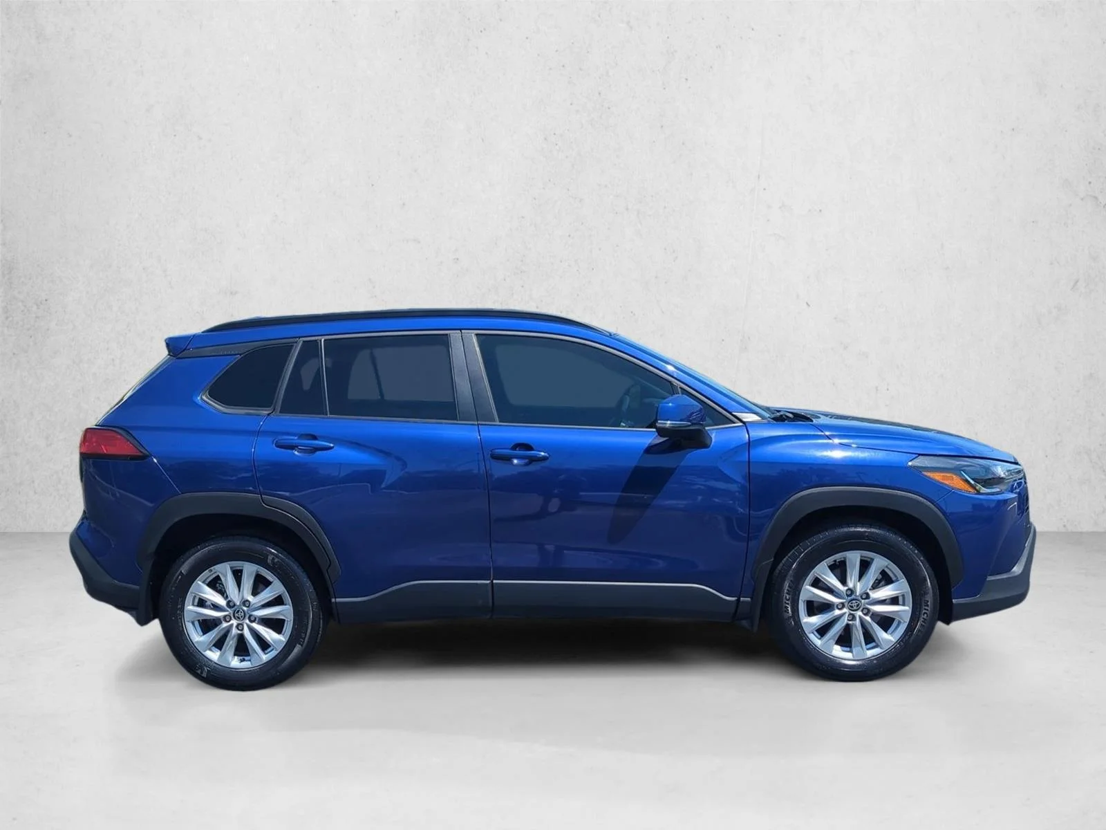Used 2024 Blue Crush Metallic Toyota LE image 4