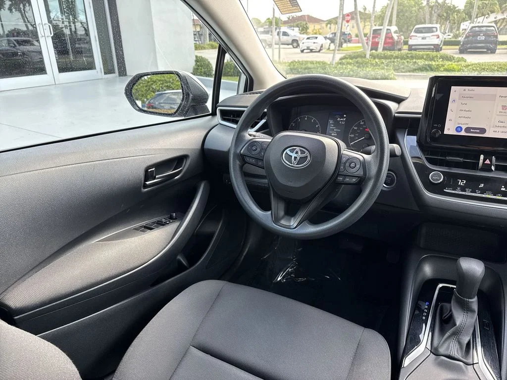Used 2023 Classic Silver Metallic Toyota LE image 21