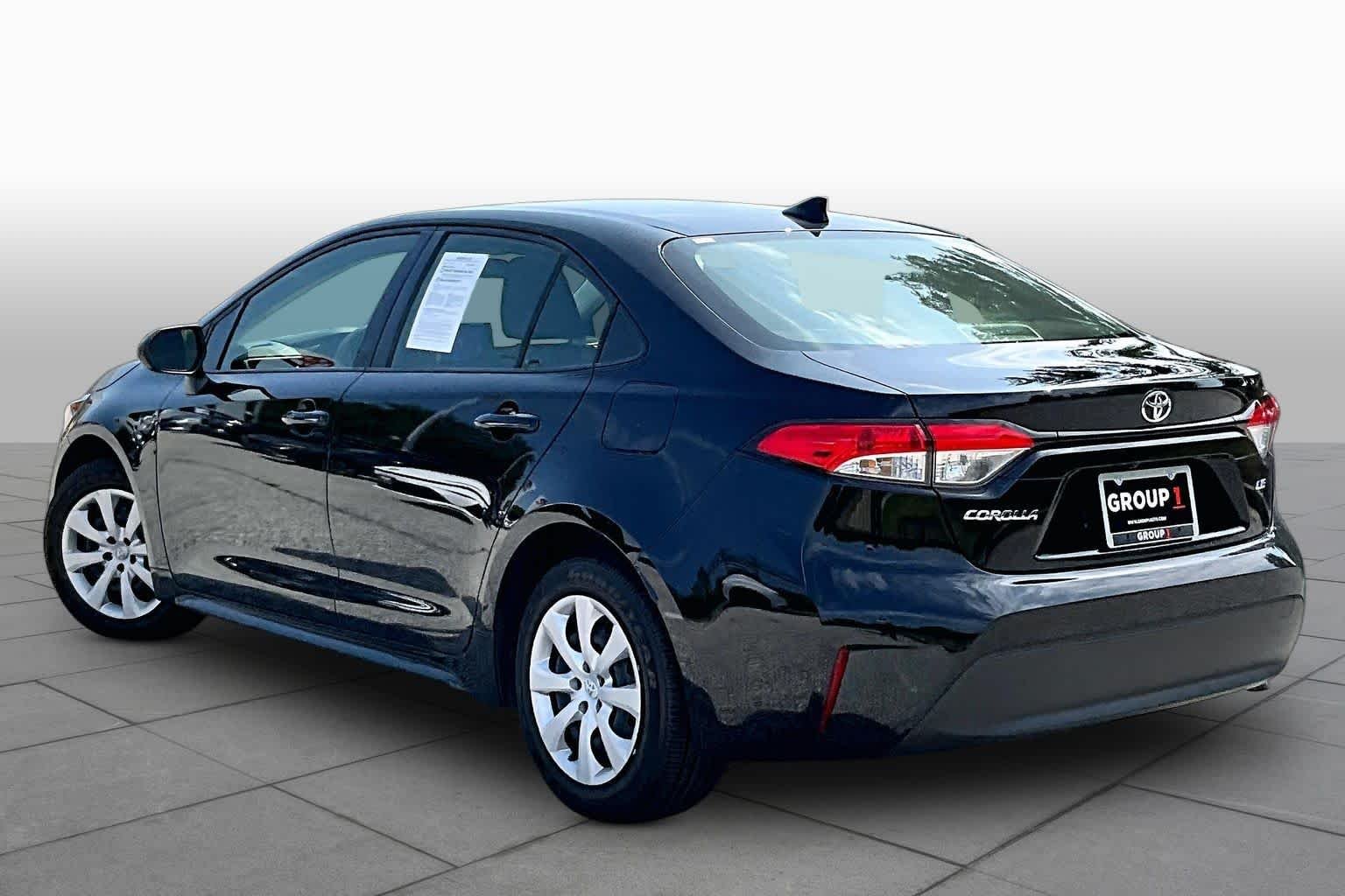 Used 2024 Midnight Black Metallic Toyota LE image 23