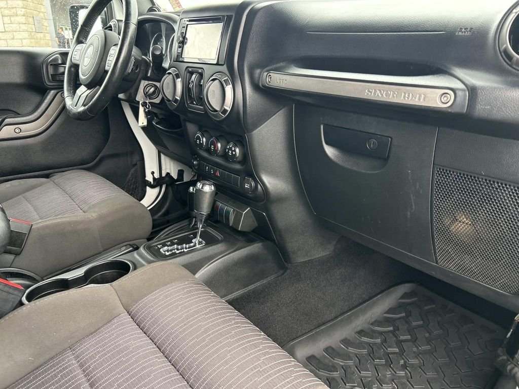 Used 2012 Bright White Jeep Unlimited Sport image 19