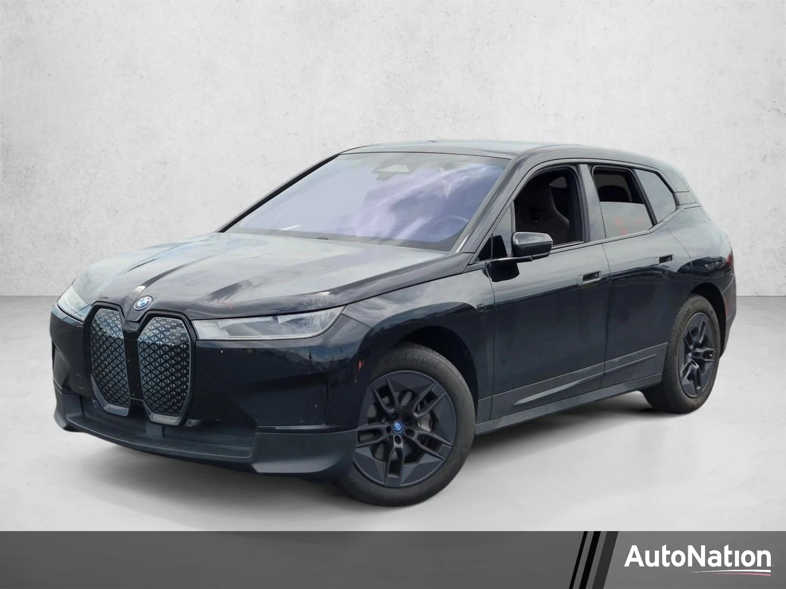 Used 2024 Black Sapphire Metallic BMW xDrive50 image 1